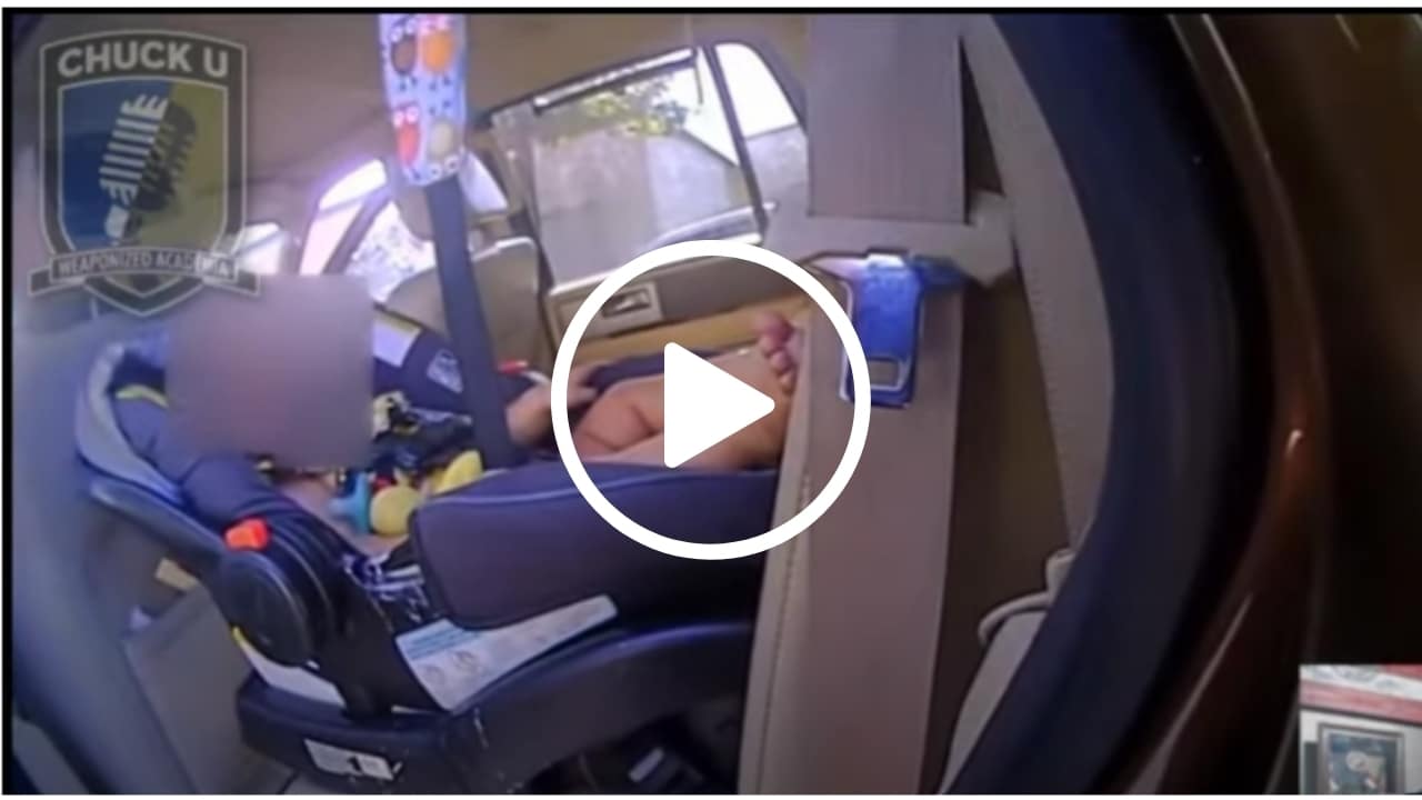 WATCH Police Officer Saves Baby Left In Hot Car