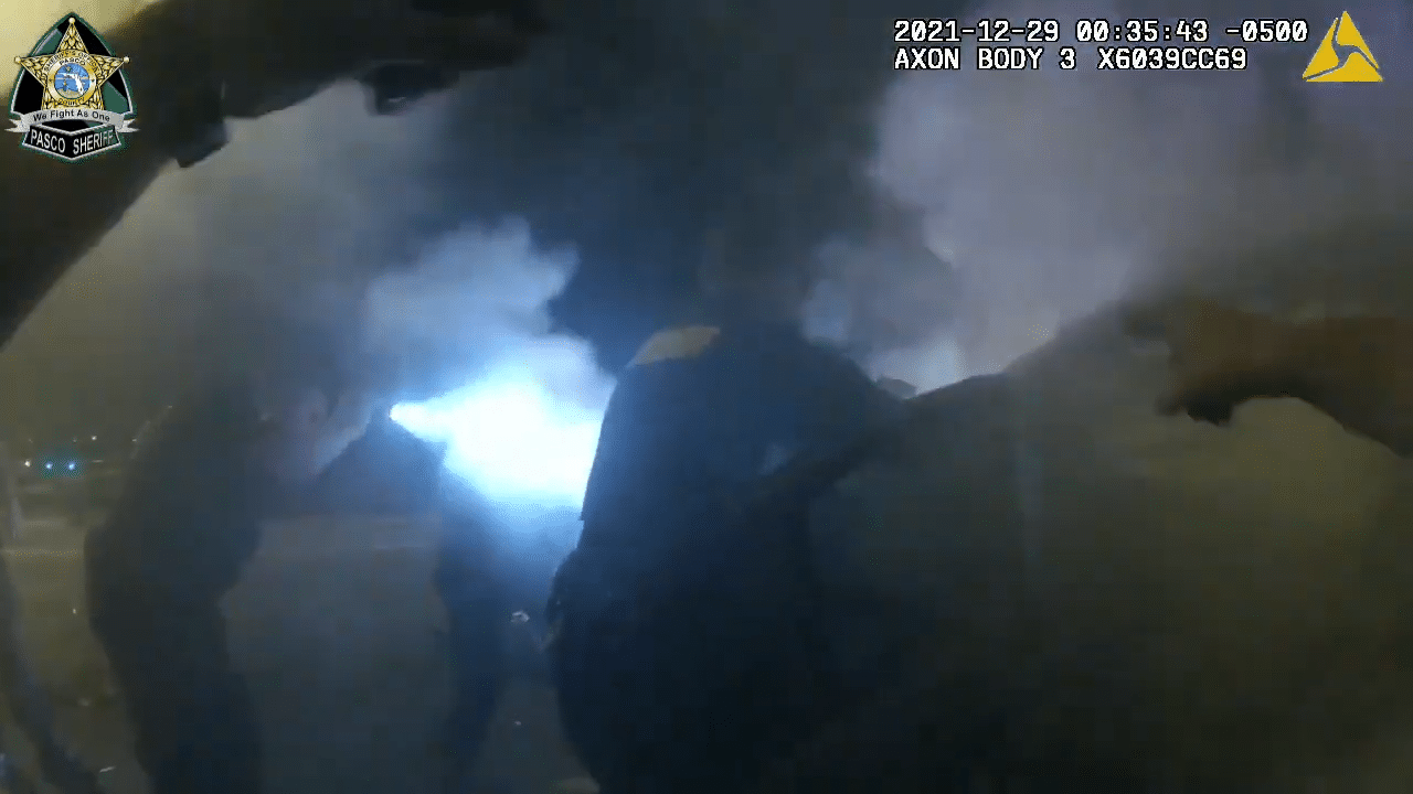 Body camera video shows Florida deputies rescuing person trapped inside burning car 1-12 screenshot